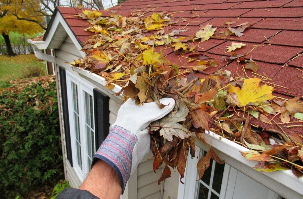 Expert from Refresh Power Washing inspecting and servicing gutters in Bethlehem to show local trust and professionalism. Gutter Cleaning near me.